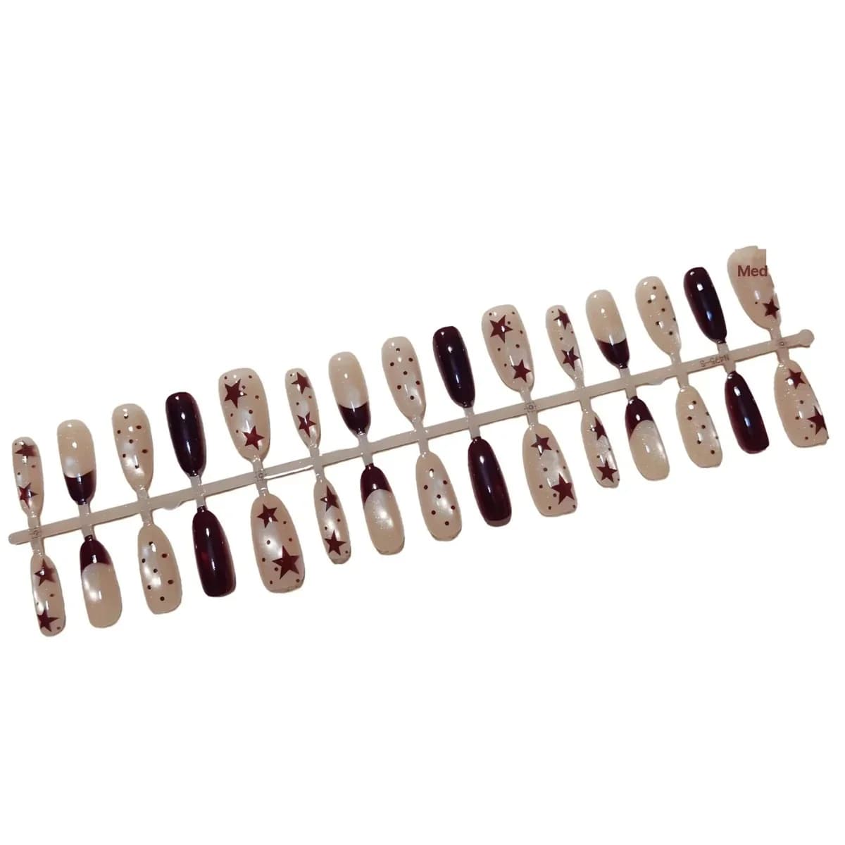ציפורניים מלאכותיות חומות עם אפקט עין החתול, כוכבים ונקודות