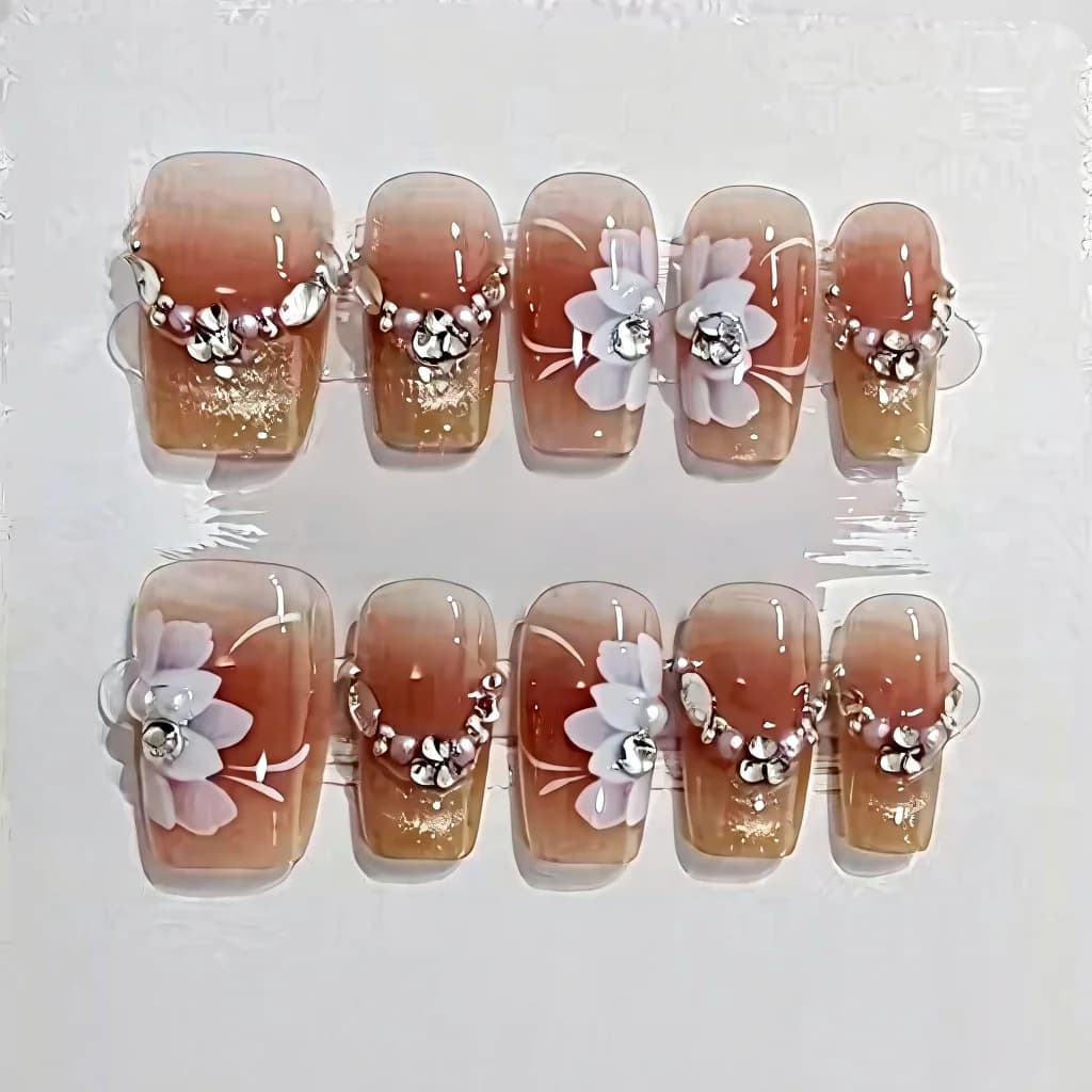 ציפורניים להדבקה עין החתול עם דוגמת פרחים וכוכבים